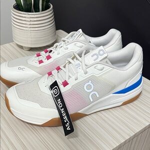 On the Roger ADV Pro Men’s White Sneakers with Pink and Blue Accents! NWOB!!